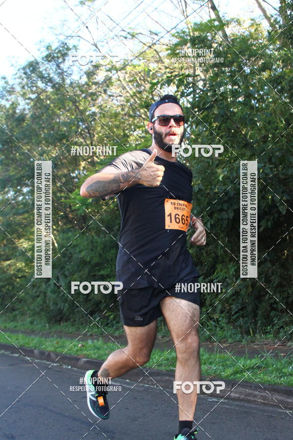 Compra tus fotos del eventoXIV Corrida UNICEP En Fotop