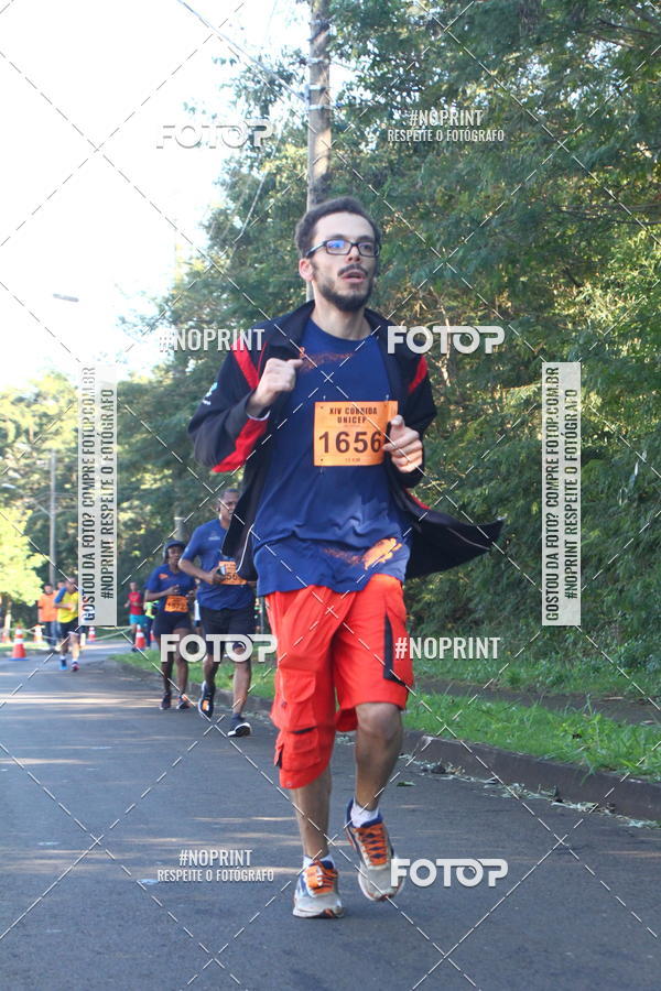 Compra tus fotos del eventoXIV Corrida UNICEP En Fotop