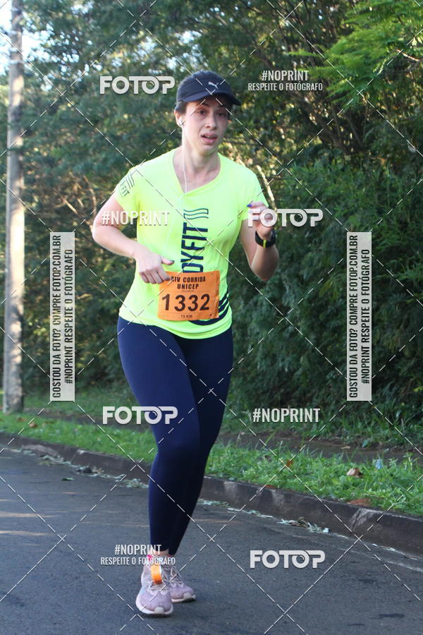 Compre suas fotos do eventoXIV Corrida UNICEP no Fotop
