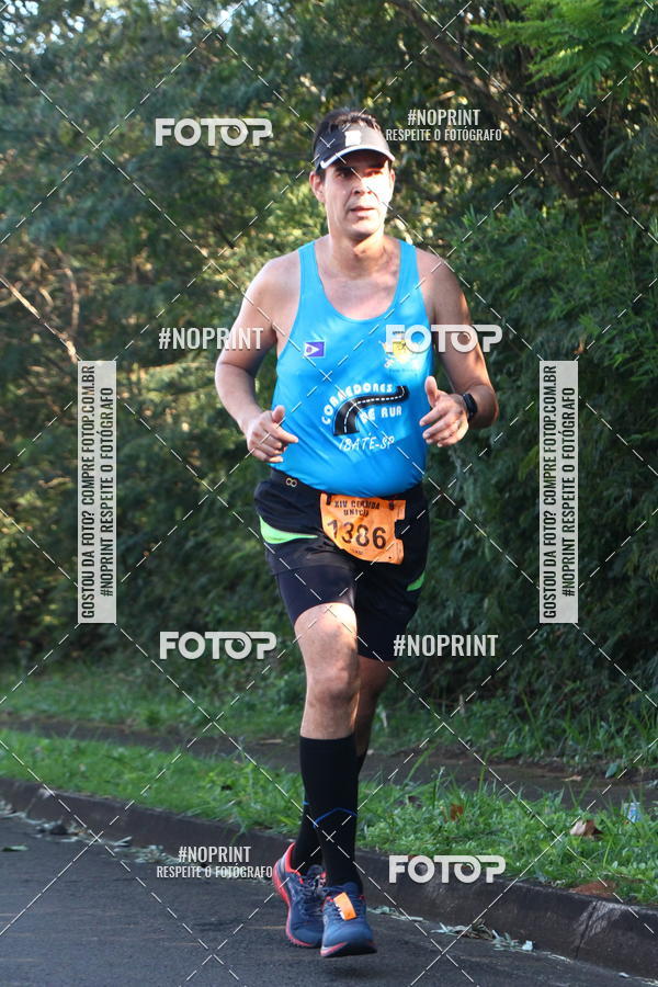 Compre suas fotos do eventoXIV Corrida UNICEP no Fotop