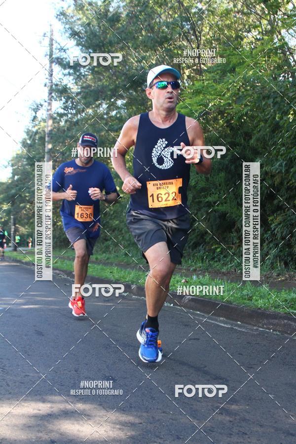 Compre suas fotos do eventoXIV Corrida UNICEP no Fotop