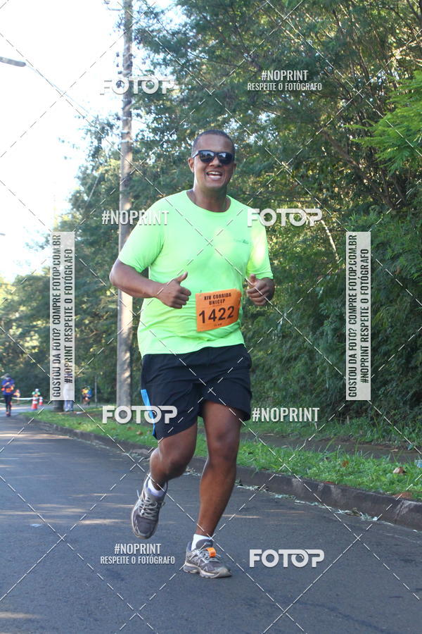 Compre suas fotos do eventoXIV Corrida UNICEP no Fotop