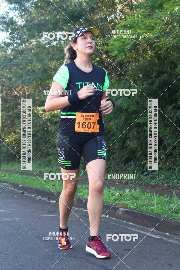 Compra tus fotos del eventoXIV Corrida UNICEP En Fotop