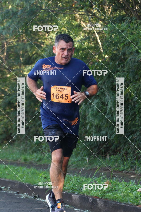 Compre as suas fotos do eventoXIV Corrida UNICEP no Fotop