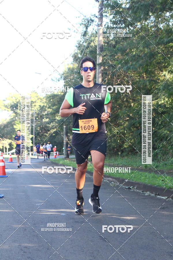 Compre suas fotos do eventoXIV Corrida UNICEP no Fotop