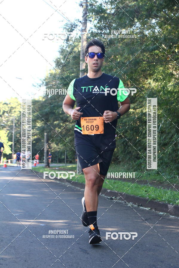Compre suas fotos do eventoXIV Corrida UNICEP no Fotop
