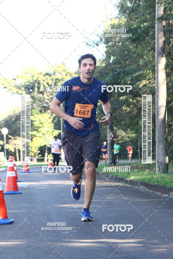 Compre suas fotos do eventoXIV Corrida UNICEP no Fotop