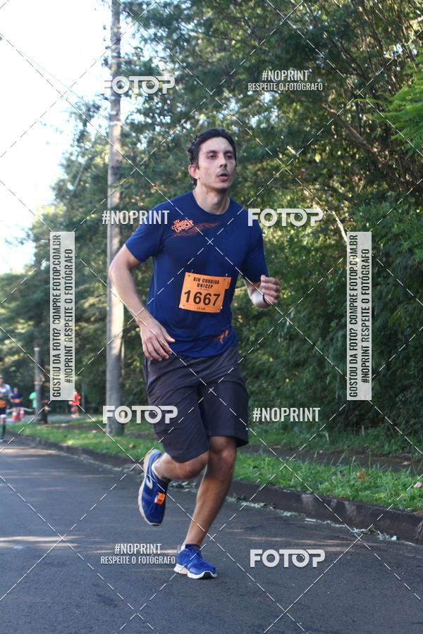 Compre suas fotos do eventoXIV Corrida UNICEP no Fotop