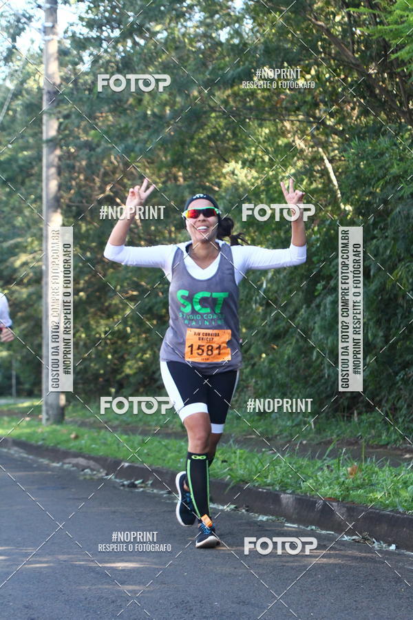 Compre suas fotos do eventoXIV Corrida UNICEP no Fotop