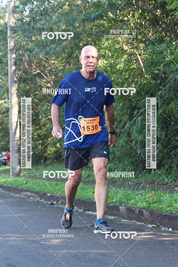 Compra tus fotos del eventoXIV Corrida UNICEP En Fotop
