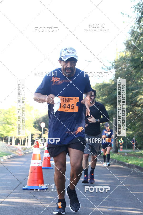 Compra tus fotos del eventoXIV Corrida UNICEP En Fotop