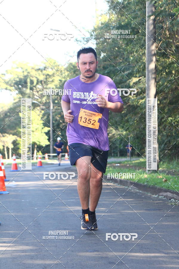 Compre suas fotos do eventoXIV Corrida UNICEP no Fotop