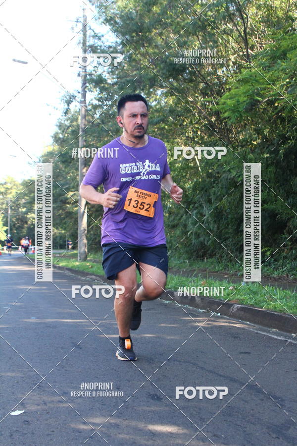 Compre suas fotos do eventoXIV Corrida UNICEP no Fotop