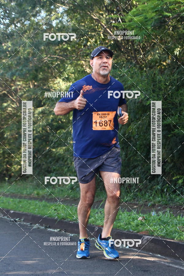Compre suas fotos do eventoXIV Corrida UNICEP no Fotop