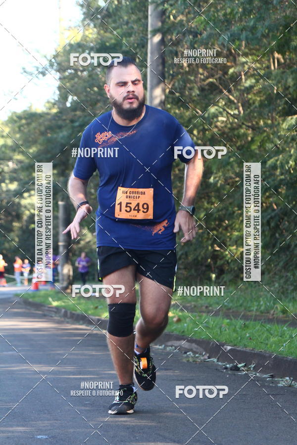 Compre as suas fotos do eventoXIV Corrida UNICEP no Fotop