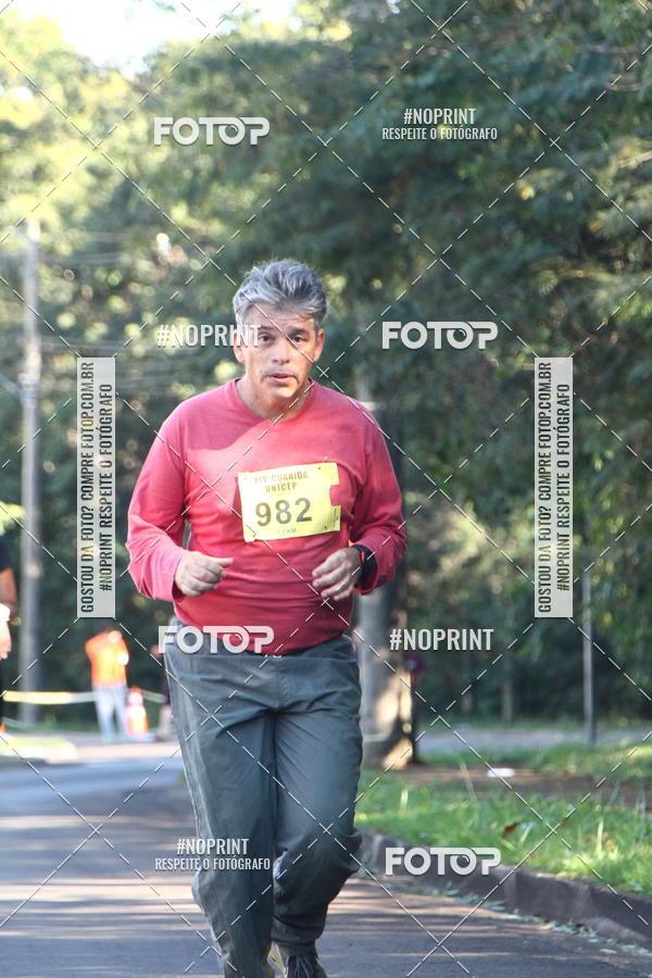 Compre suas fotos do eventoXIV Corrida UNICEP no Fotop