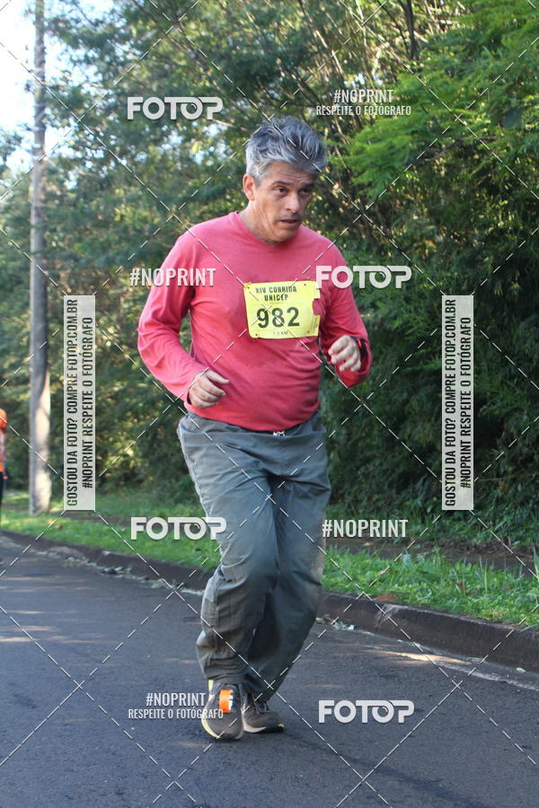Compre suas fotos do eventoXIV Corrida UNICEP no Fotop