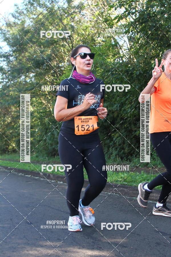 Compre suas fotos do eventoXIV Corrida UNICEP no Fotop