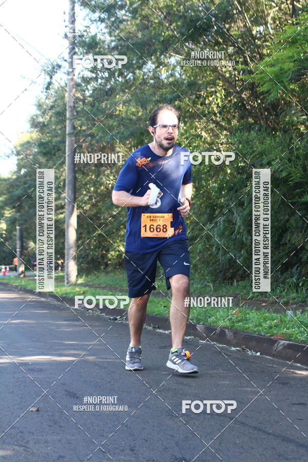 Compre suas fotos do eventoXIV Corrida UNICEP no Fotop