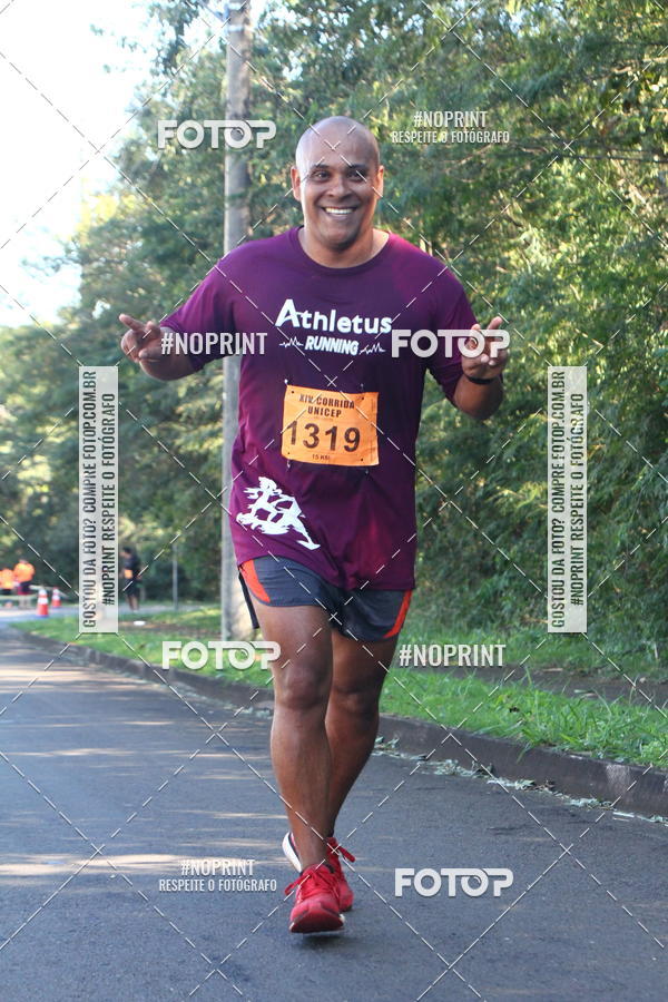 Compre suas fotos do eventoXIV Corrida UNICEP no Fotop