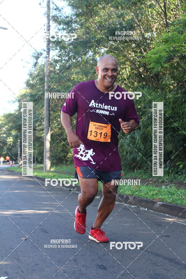 Compre suas fotos do eventoXIV Corrida UNICEP no Fotop