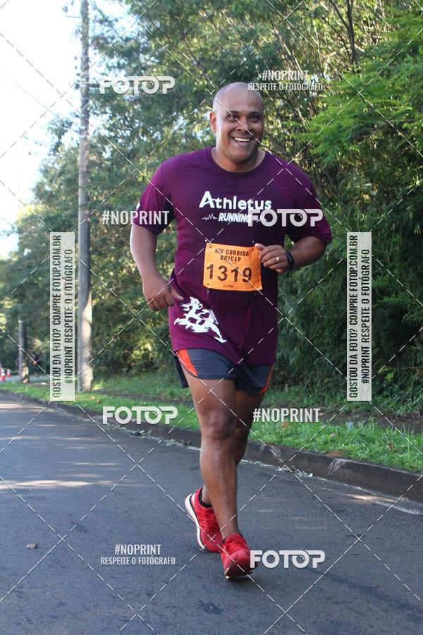 Compre suas fotos do eventoXIV Corrida UNICEP no Fotop