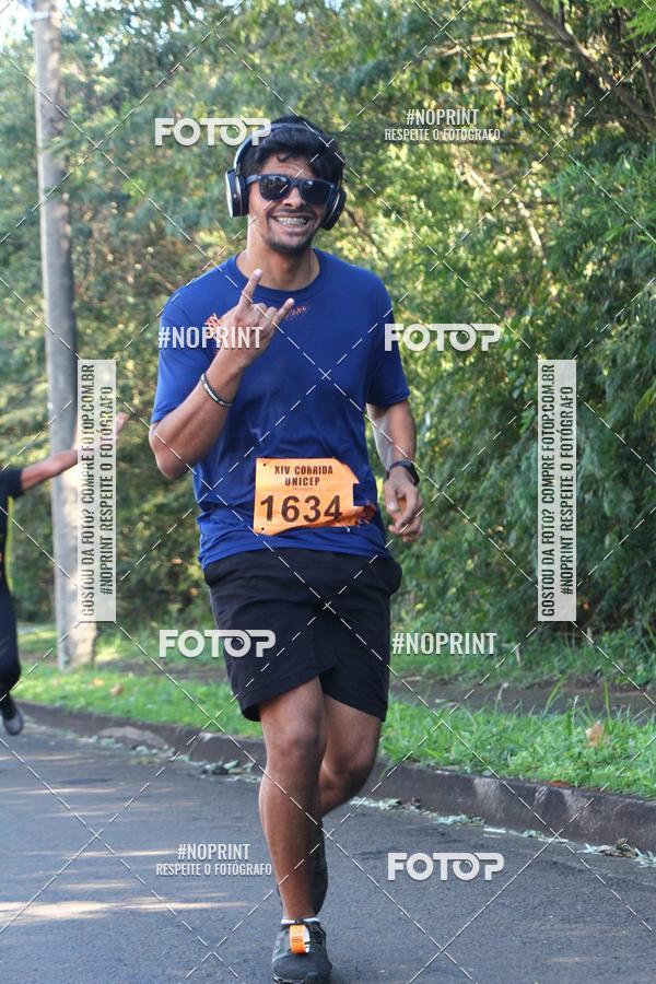 Compre suas fotos do eventoXIV Corrida UNICEP no Fotop