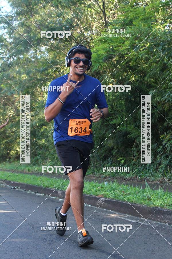 Compre suas fotos do eventoXIV Corrida UNICEP no Fotop