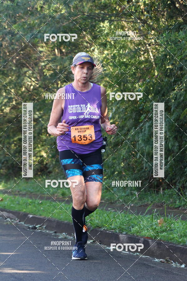 Compre suas fotos do eventoXIV Corrida UNICEP no Fotop
