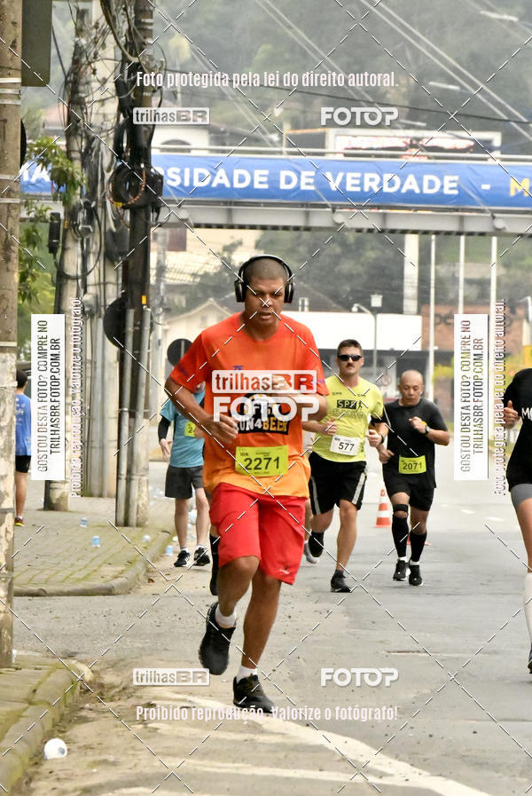 Buy your photos of the eventMeia Maratona de Blumenau on Fotop