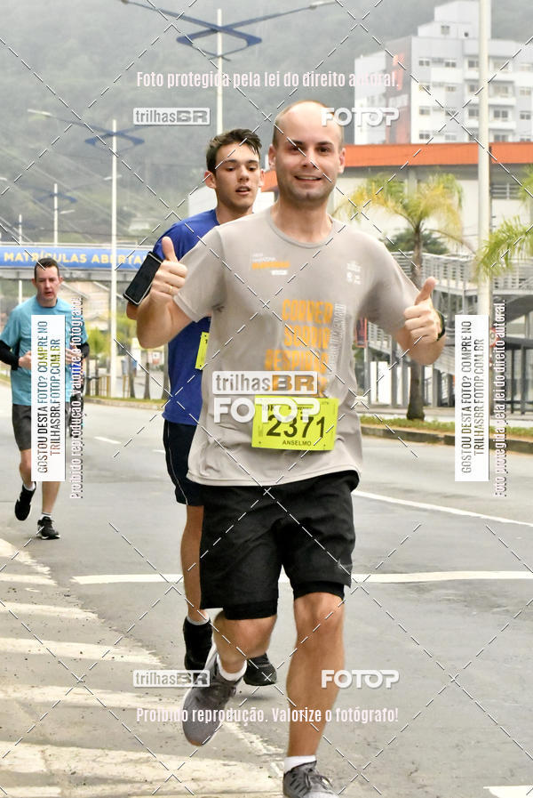 Buy your photos of the eventMeia Maratona de Blumenau on Fotop