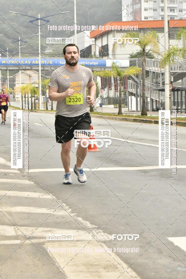 Buy your photos of the eventMeia Maratona de Blumenau on Fotop