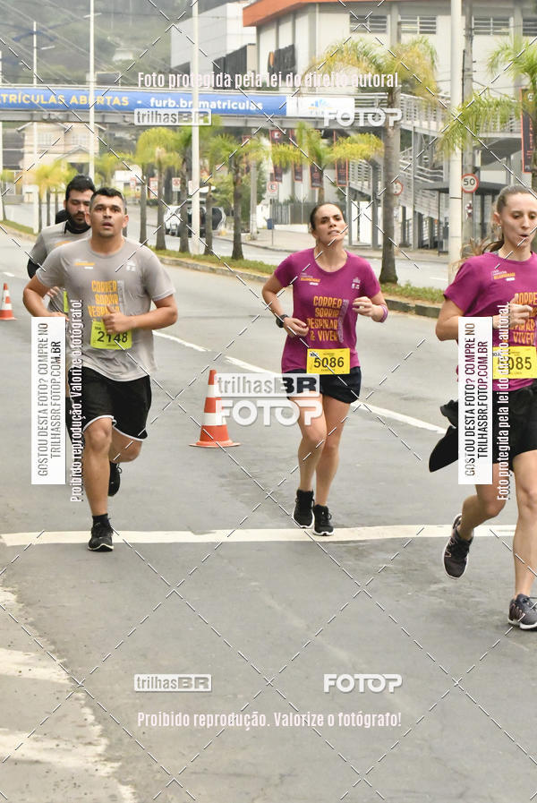 Buy your photos of the eventMeia Maratona de Blumenau on Fotop