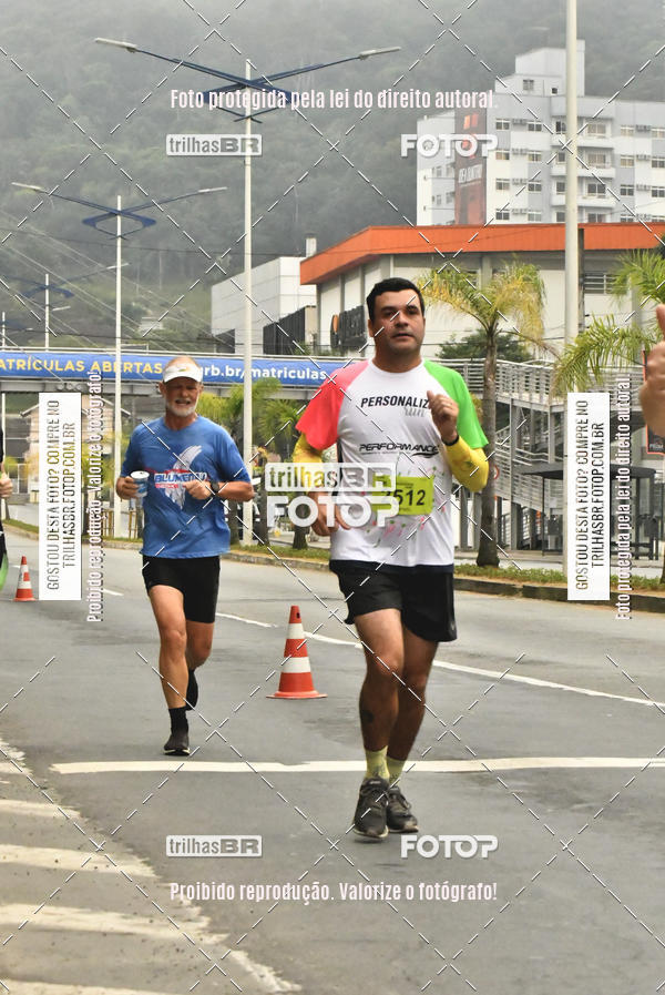Buy your photos of the eventMeia Maratona de Blumenau on Fotop