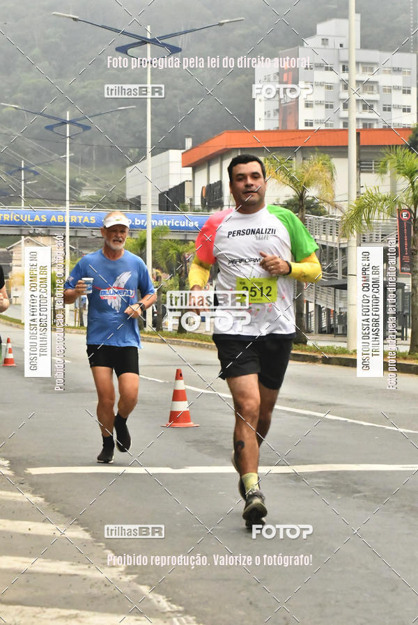 Buy your photos of the eventMeia Maratona de Blumenau on Fotop