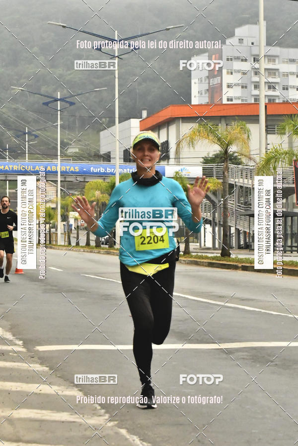 Buy your photos of the eventMeia Maratona de Blumenau on Fotop