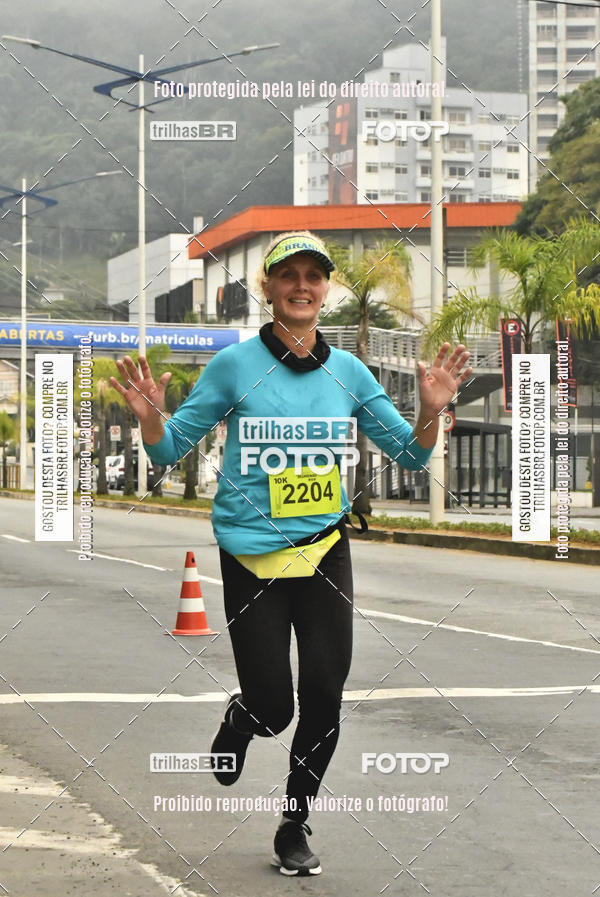 Buy your photos of the eventMeia Maratona de Blumenau on Fotop