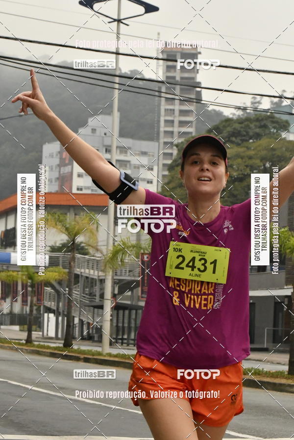 Buy your photos of the eventMeia Maratona de Blumenau on Fotop