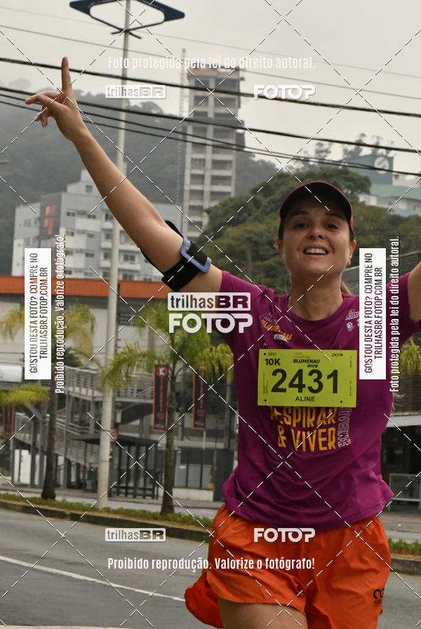 Buy your photos of the eventMeia Maratona de Blumenau on Fotop