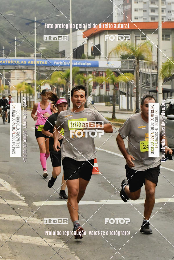 Buy your photos of the eventMeia Maratona de Blumenau on Fotop