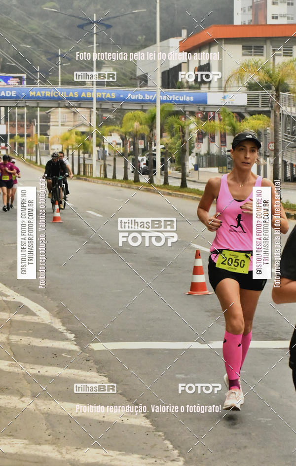 Buy your photos of the eventMeia Maratona de Blumenau on Fotop