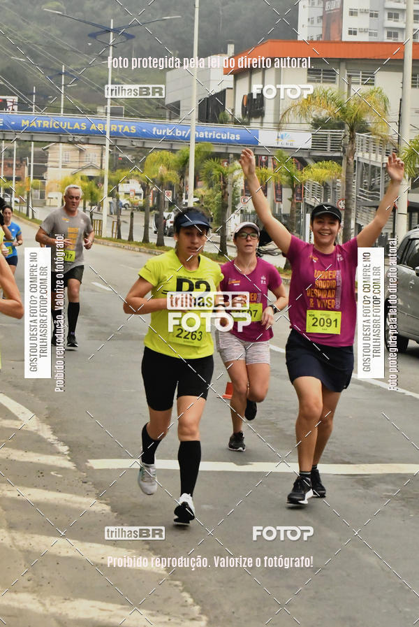 Buy your photos of the eventMeia Maratona de Blumenau on Fotop