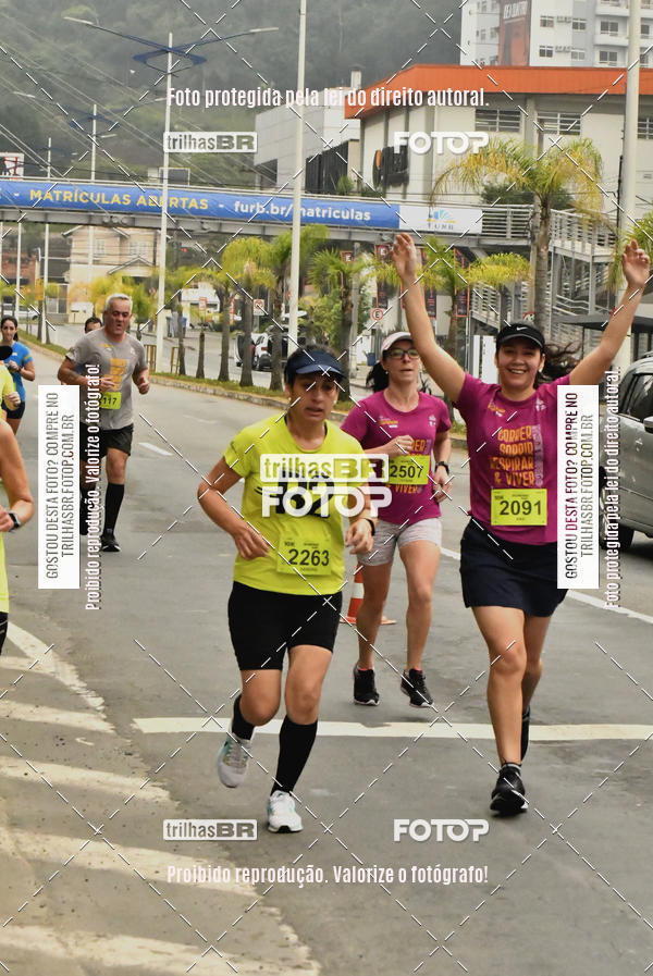 Buy your photos of the eventMeia Maratona de Blumenau on Fotop