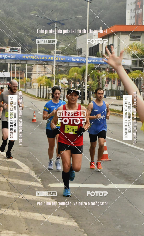 Buy your photos of the eventMeia Maratona de Blumenau on Fotop