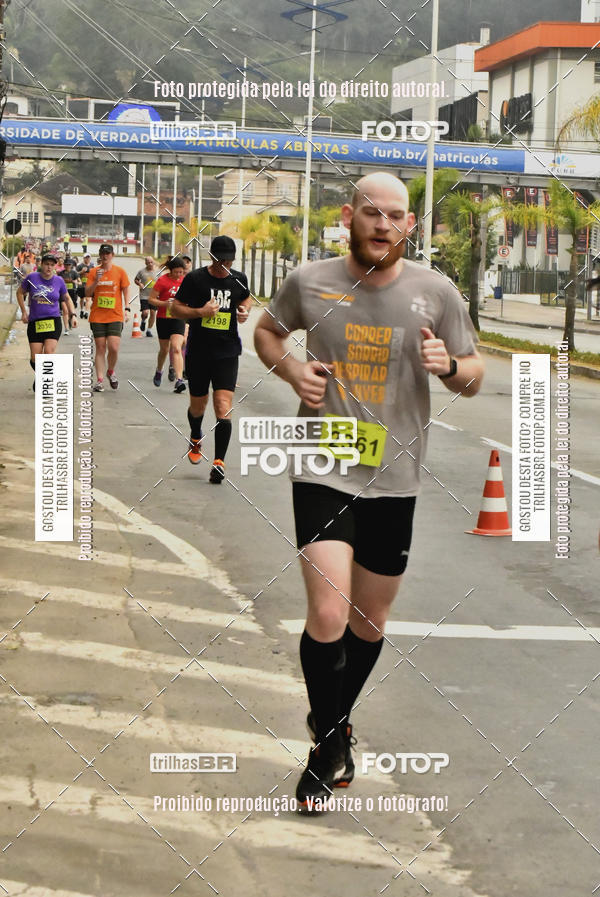 Buy your photos of the eventMeia Maratona de Blumenau on Fotop