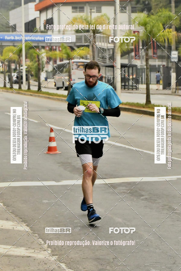 Buy your photos of the eventMeia Maratona de Blumenau on Fotop