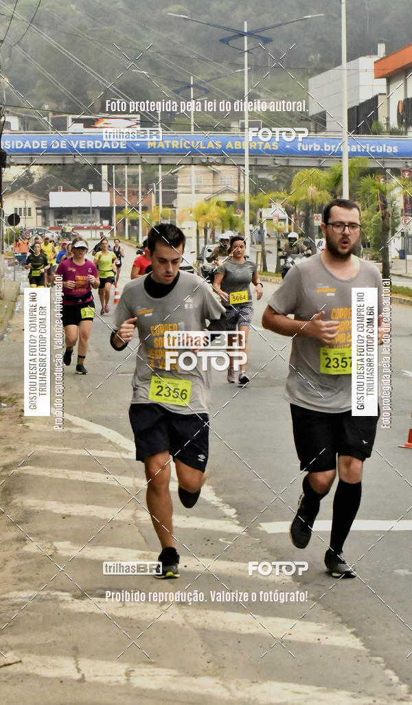 Buy your photos of the eventMeia Maratona de Blumenau on Fotop