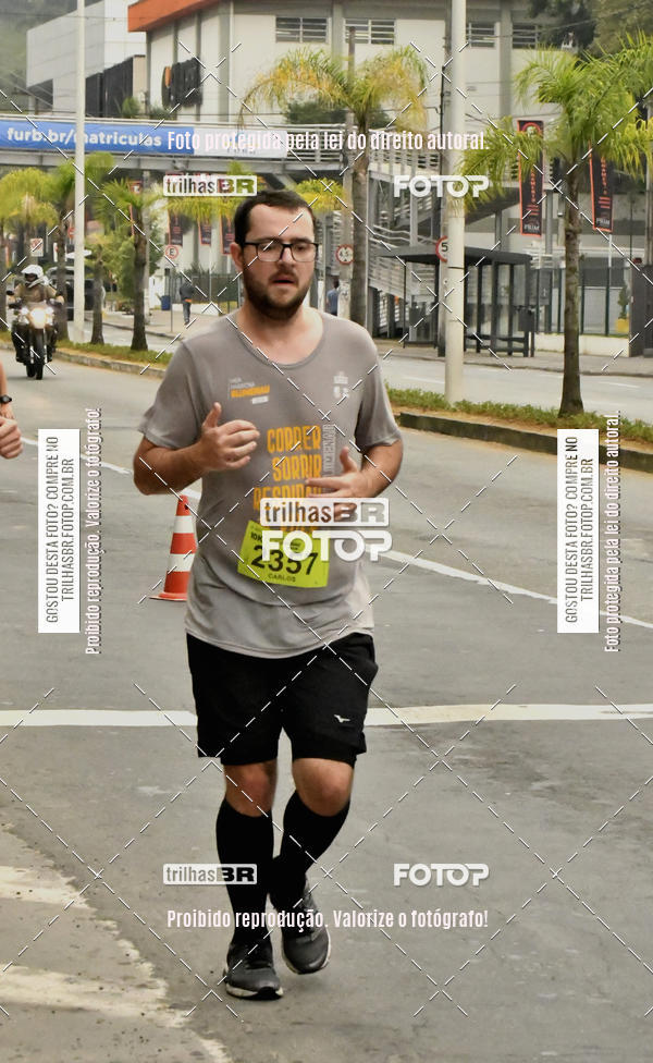 Buy your photos of the eventMeia Maratona de Blumenau on Fotop