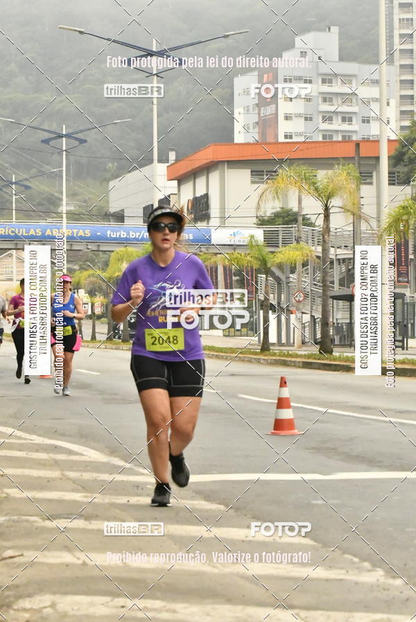 Buy your photos of the eventMeia Maratona de Blumenau on Fotop