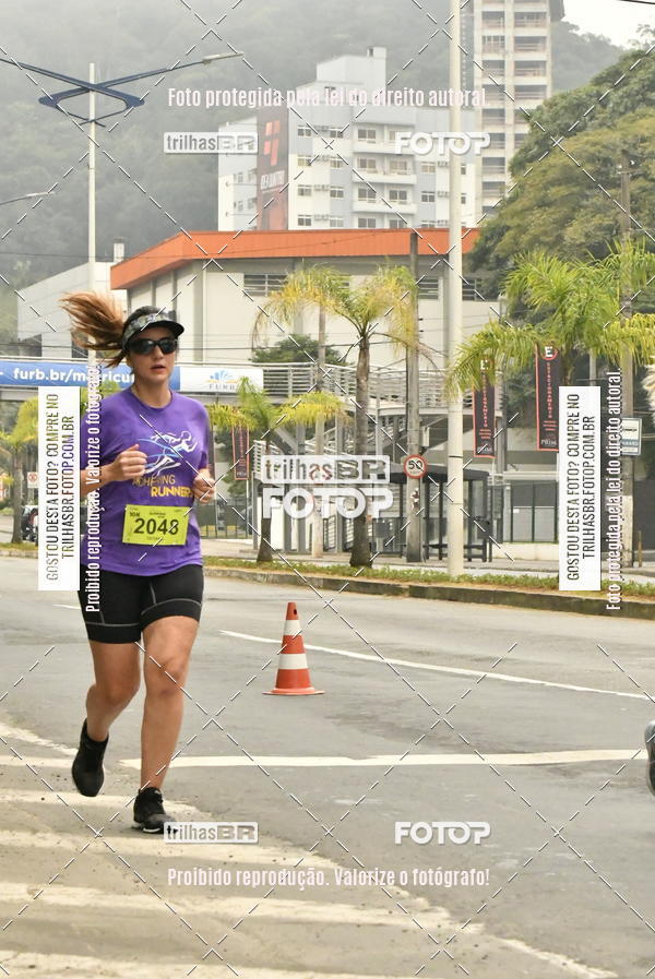 Buy your photos of the eventMeia Maratona de Blumenau on Fotop